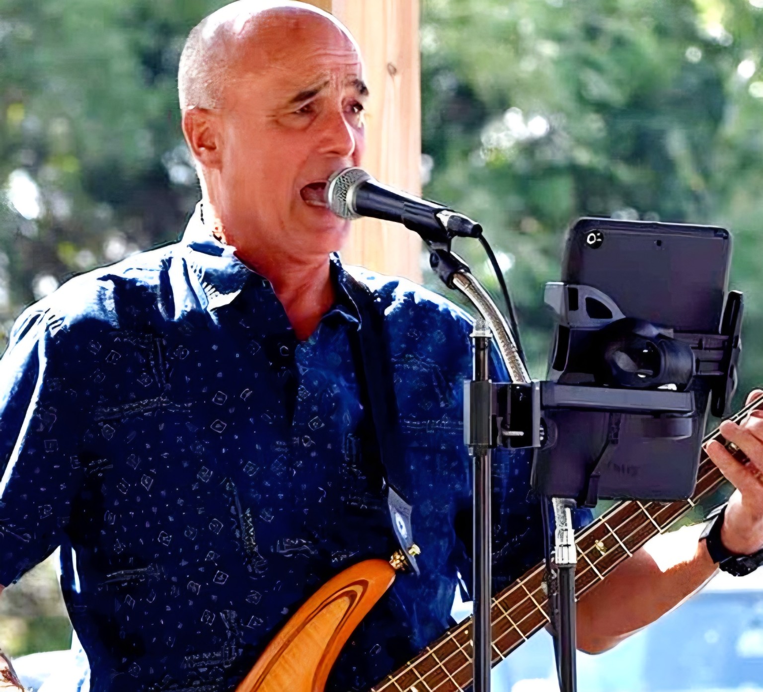 Mike Hitch playing bass and singing